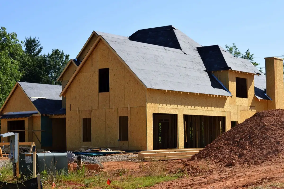 House with new roof decking and synthetic underlayment during a roof replacement in Jackson, MS