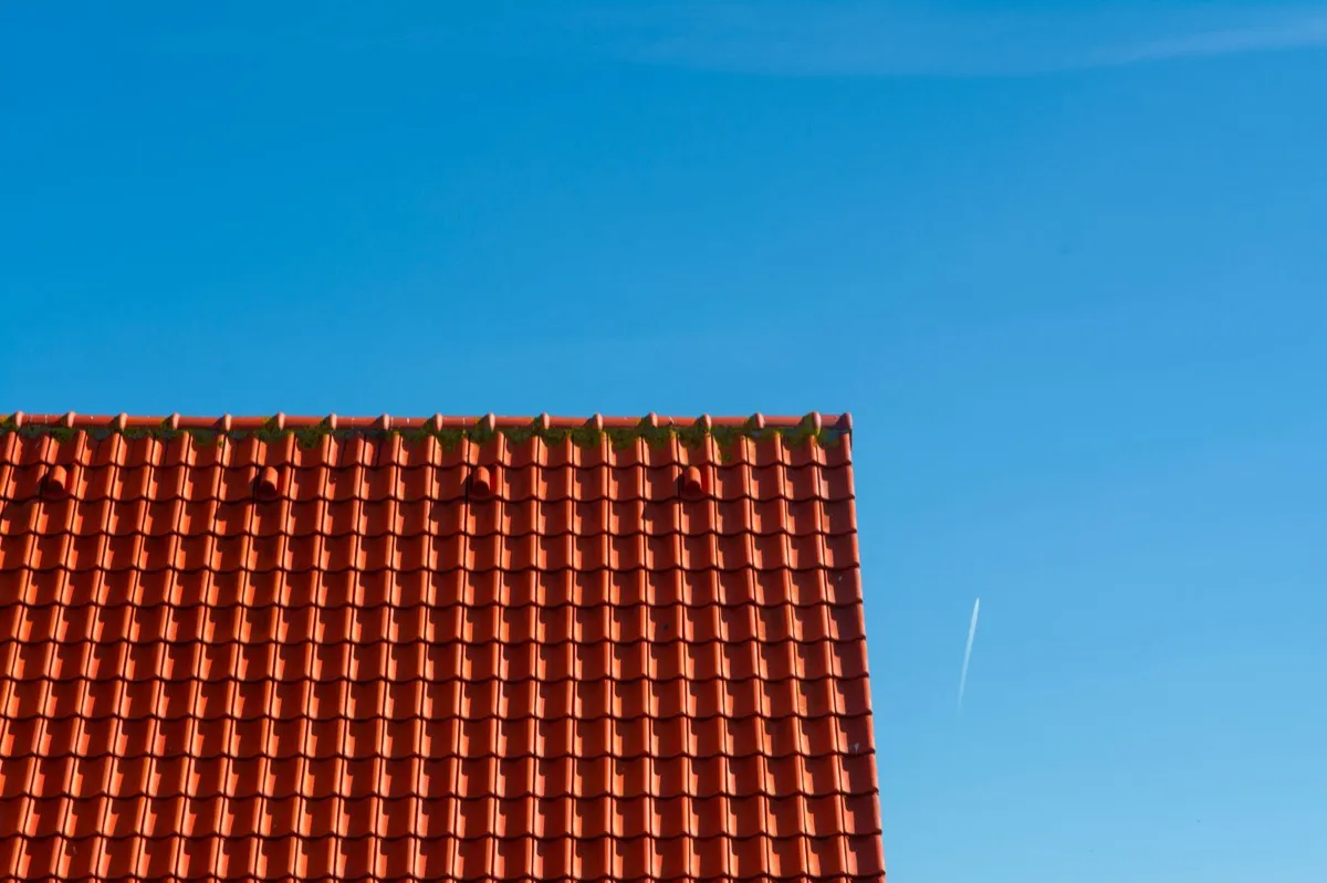 Tile roof gable in full sun, the kind of exposure that sets roof life in Jackson, MS